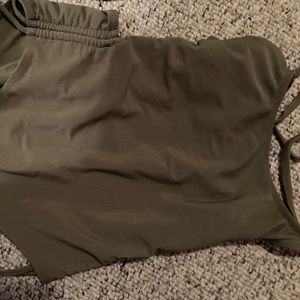 Green one piece with open back